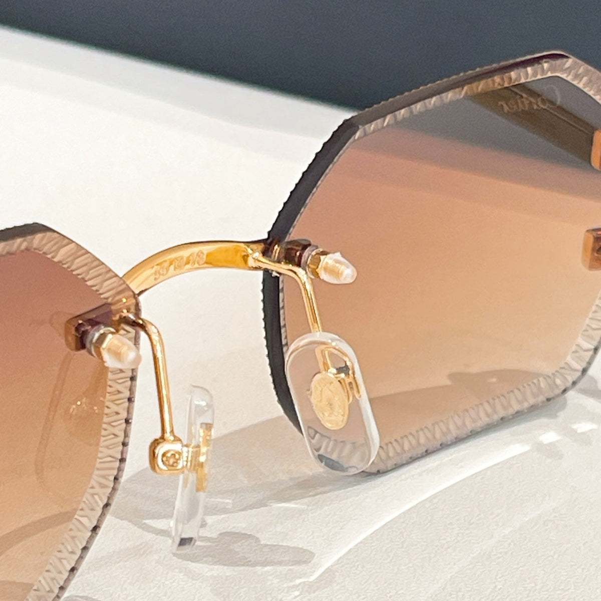 CARTIER RIMLESS GEOMETRIC FRAME SUNGLASSES CT0092O IN METAL