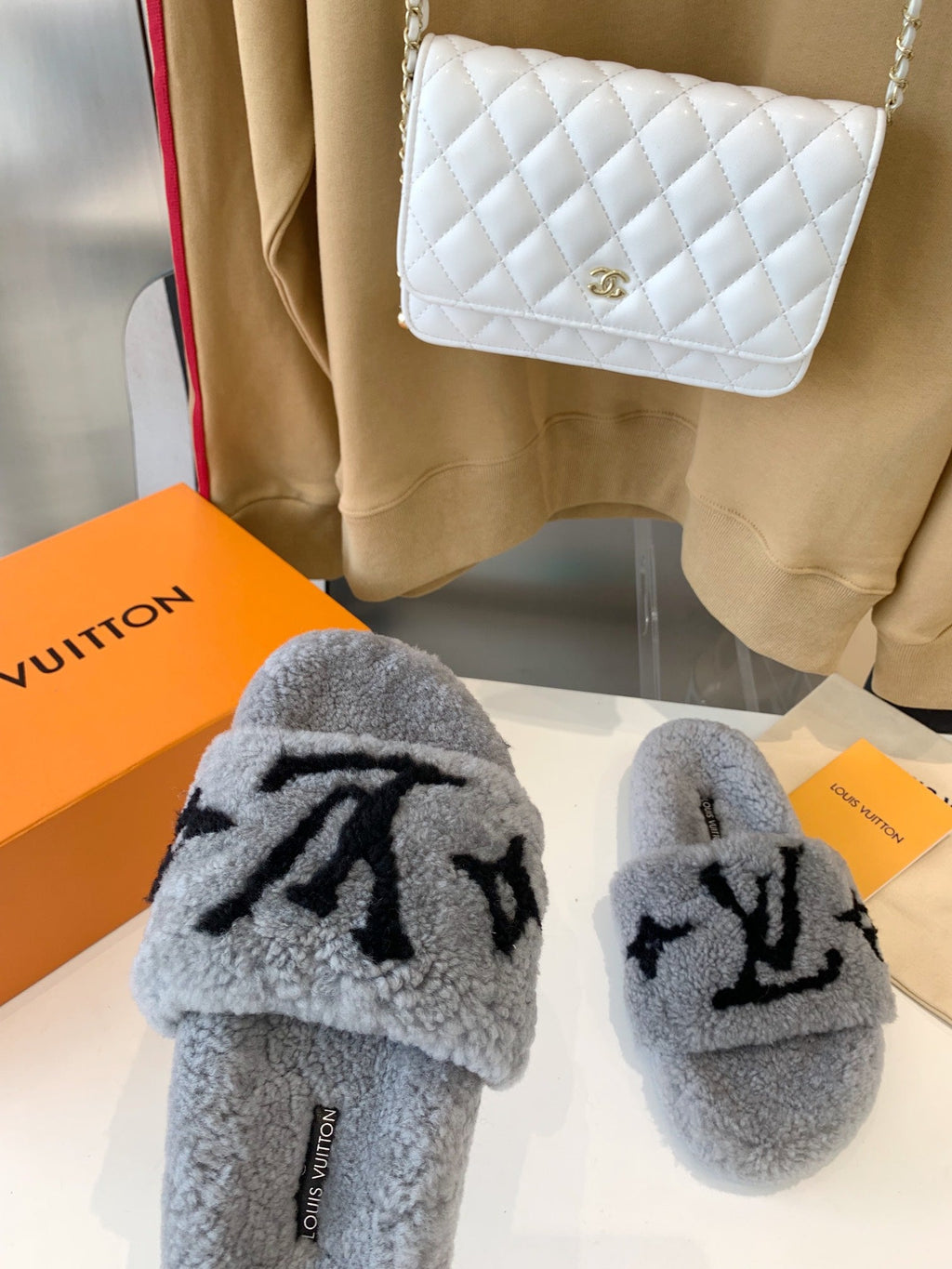 LOUIS VUITTON LV WOMEN'S PASEO FLAT SLIPPER IN GREY FLEECE WITH BLACK LOGO