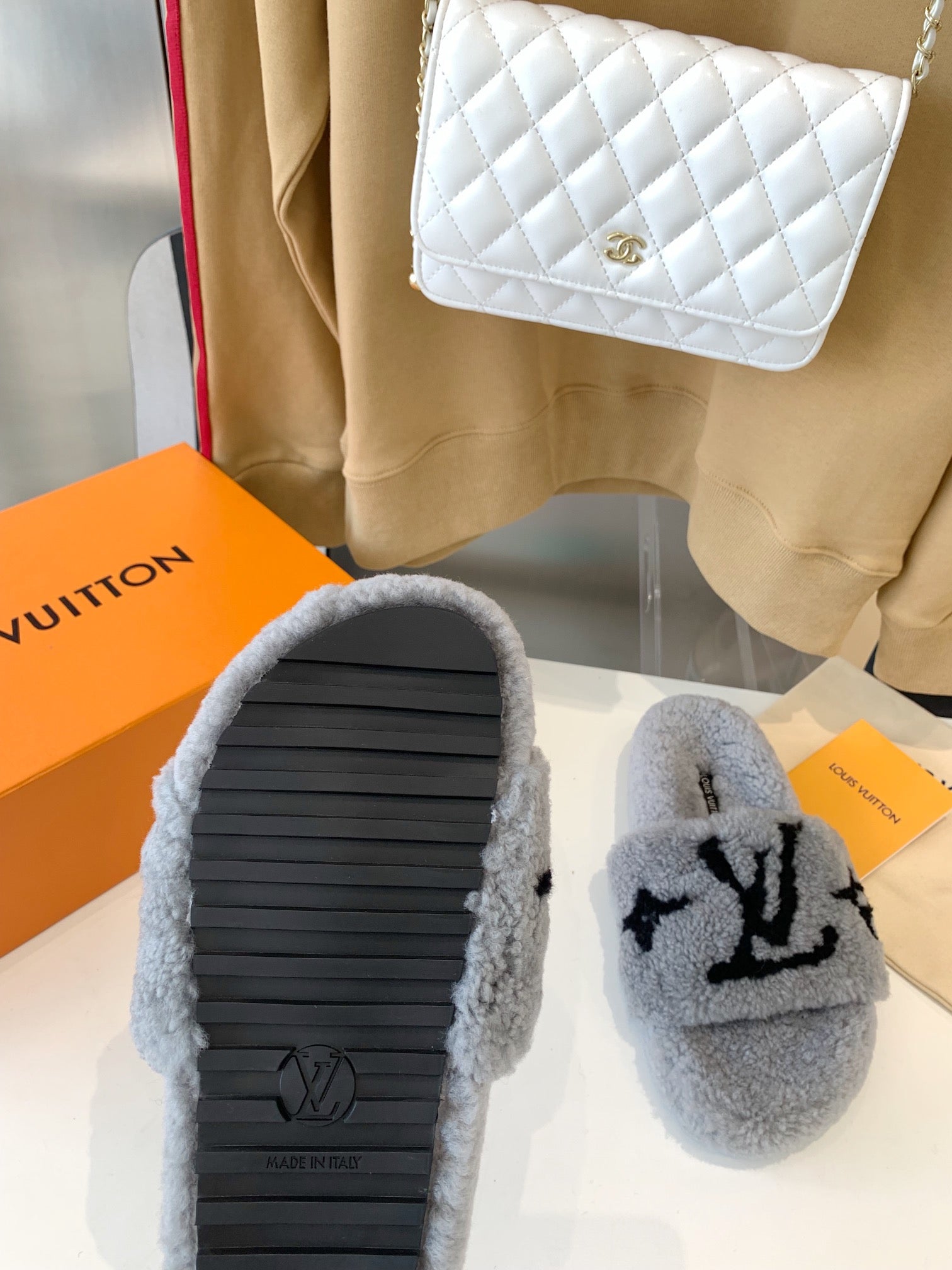 LOUIS VUITTON LV WOMEN'S PASEO FLAT SLIPPER IN GREY FLEECE WITH BLACK LOGO