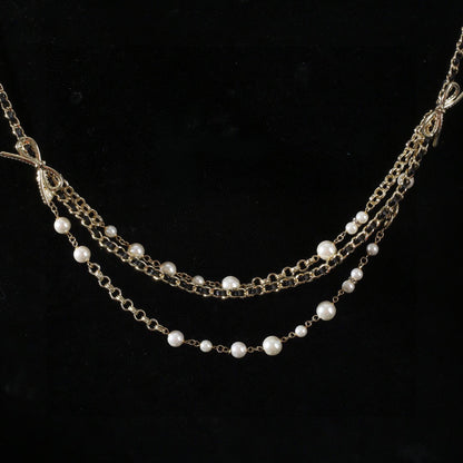 CHANEL 25S GOLD CHAIN BELT WITH PEARL 610440
