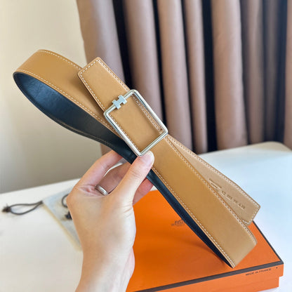 HERMES TUBE H BELT BUCKLE & REVERSIBLE PASTEL ORANGE AND BLACK LEATHER STRAP 38MM SILVER HARDWARE