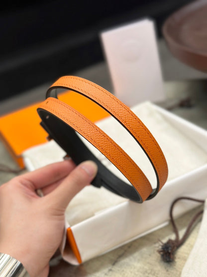 HERMES FOCUS BUCKLE & REVERSIBLE BLACK AND ORANGE LEATHER STRAP 13MM COPPER HARDWARE