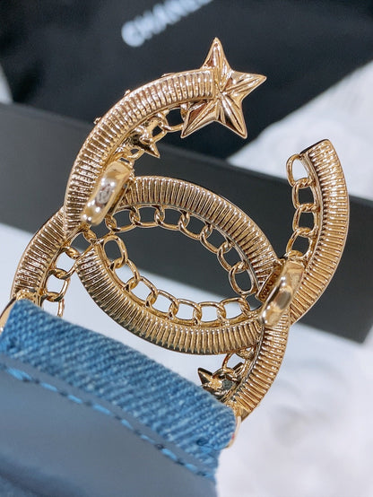 CHANEL DOUBLE C ELASTIC BELT 30MM IN BLUE DENIM GOLD CRYSTAL STAR EMBELLISHED BUCKLE
