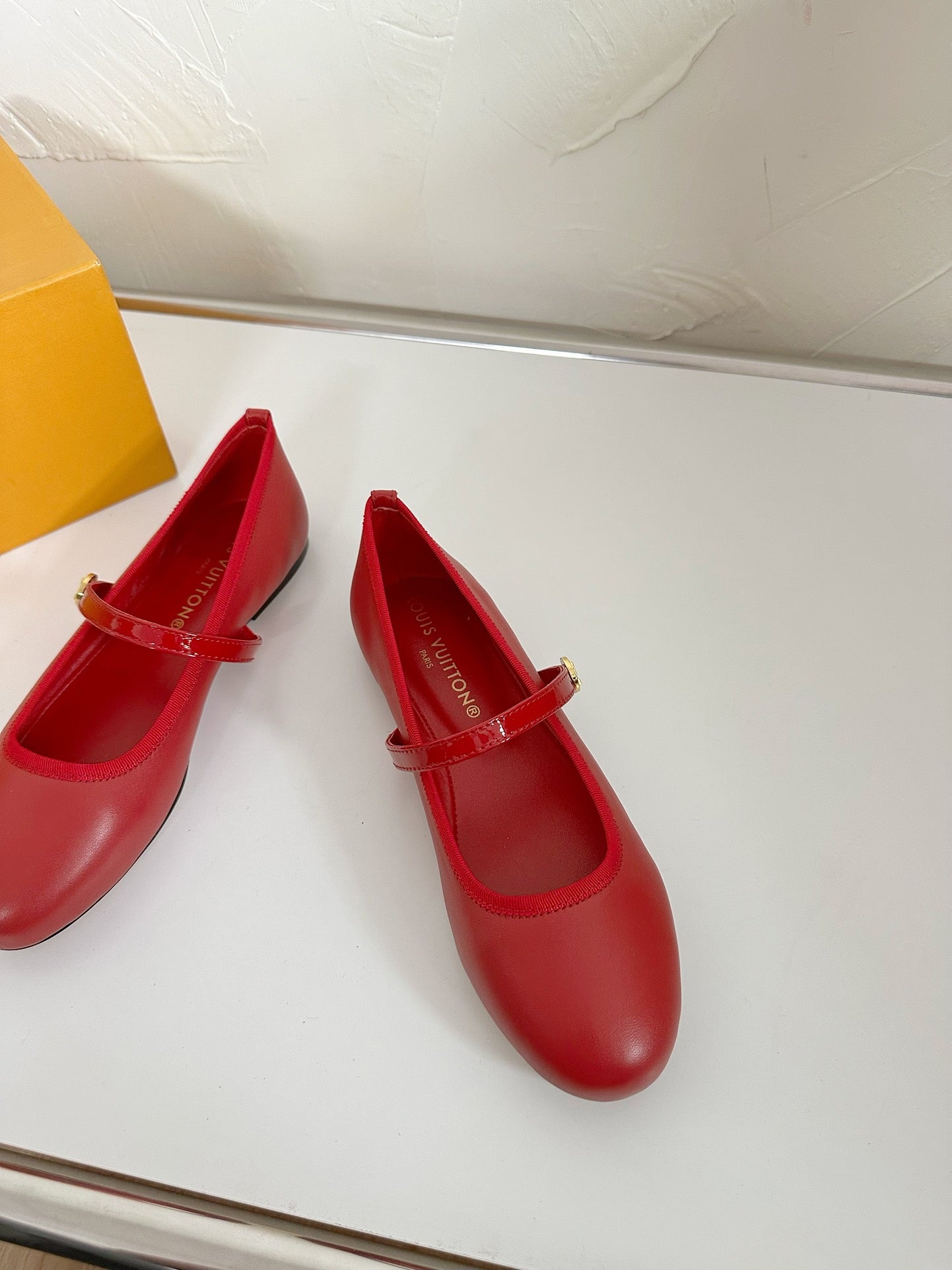 LOUIS VUITTON ROMY FLAT BALLERINA IN RUBY RED CALFSKIN