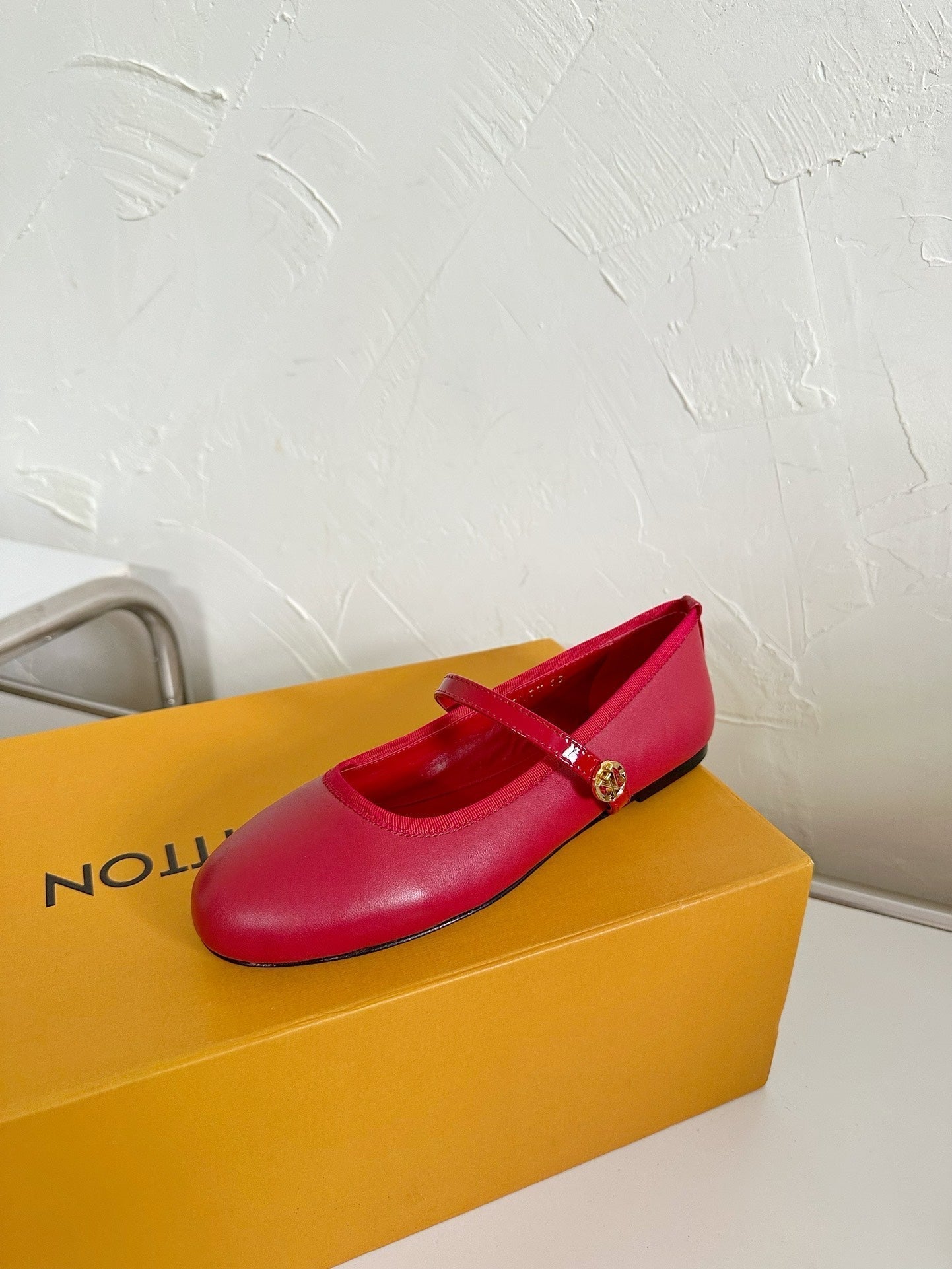LOUIS VUITTON ROMY FLAT BALLERINA IN RUBY RED CALFSKIN