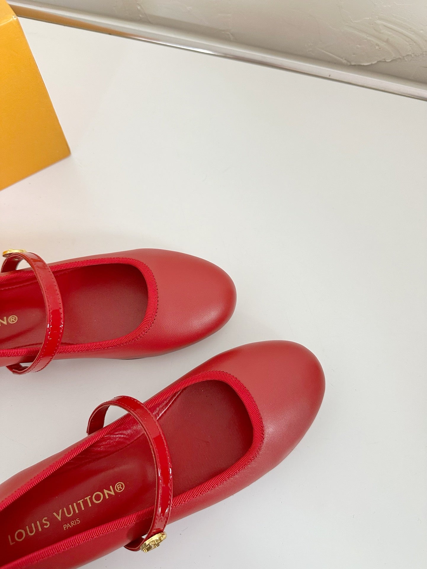 LOUIS VUITTON ROMY FLAT BALLERINA IN RUBY RED CALFSKIN
