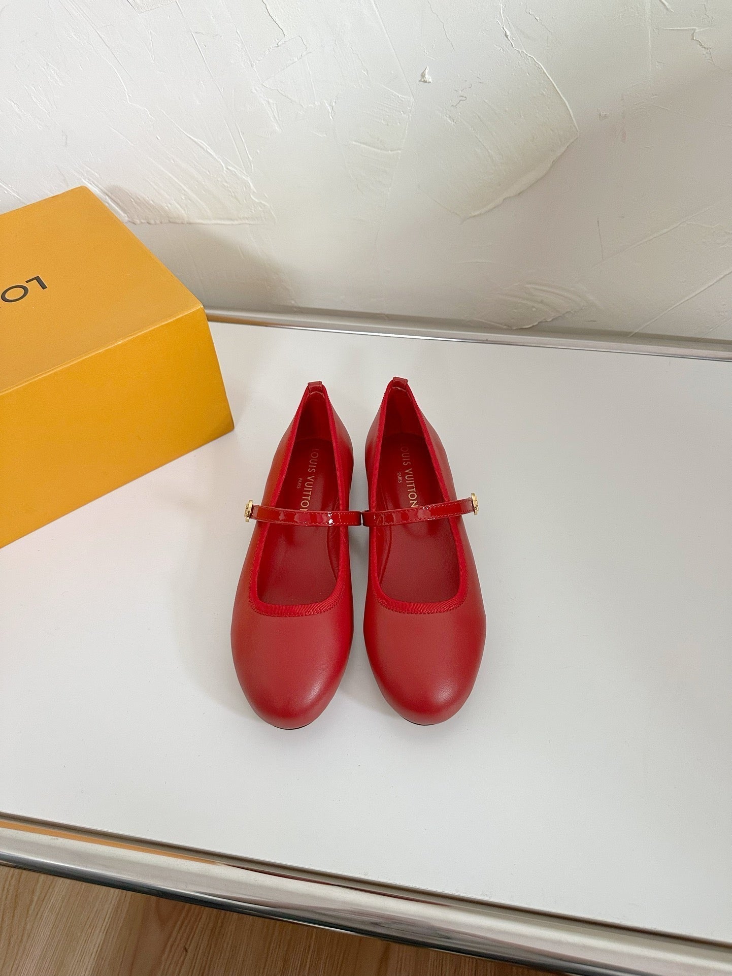 LOUIS VUITTON ROMY FLAT BALLERINA IN RUBY RED CALFSKIN