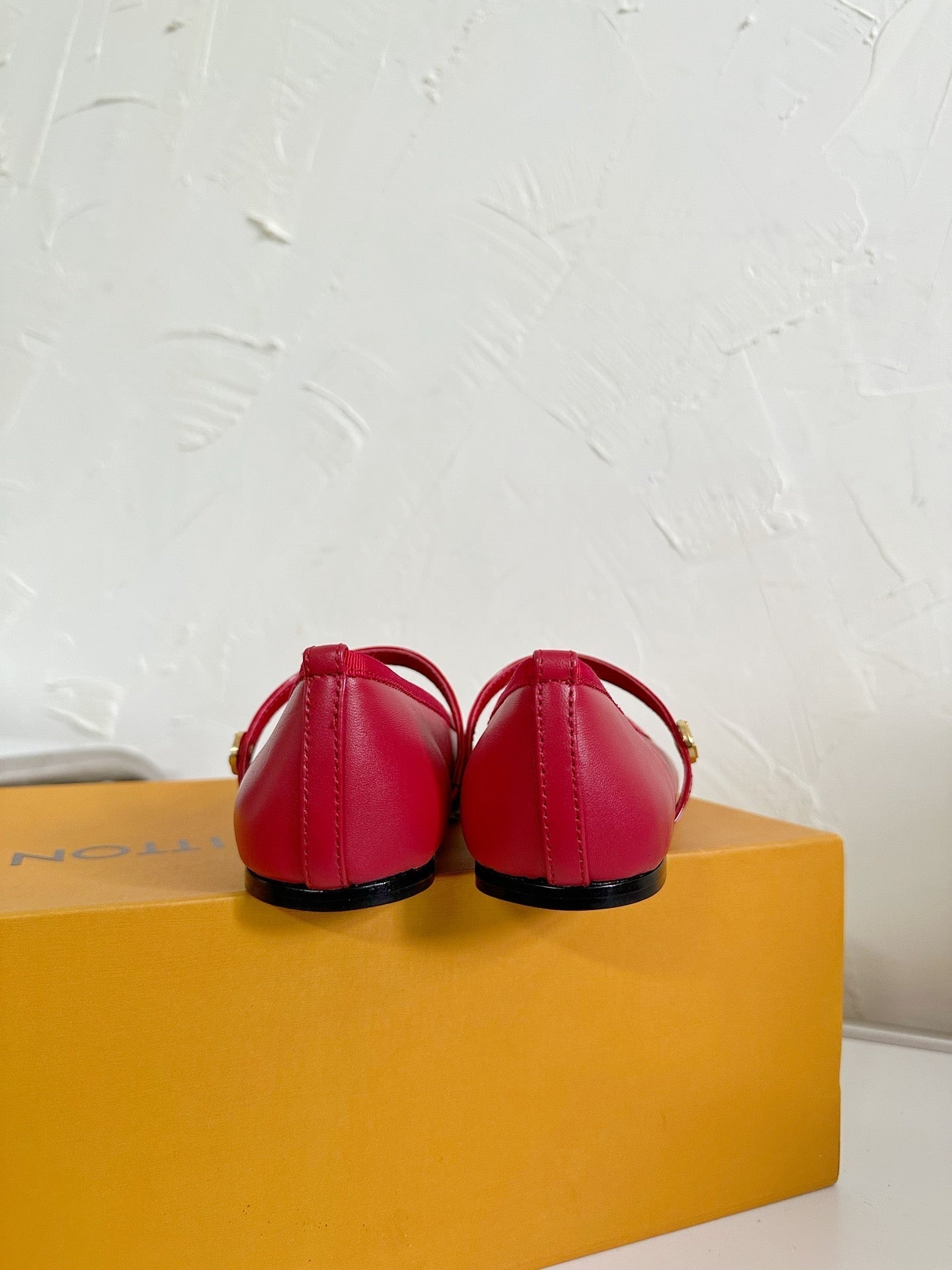 LOUIS VUITTON ROMY FLAT BALLERINA IN RUBY RED CALFSKIN
