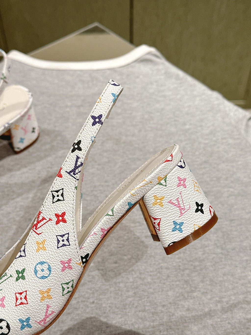 LOUIS VUITTON SWING SLINGBACK PUMP 55 MM IN WHITE MONOGRAM CALFSKIN