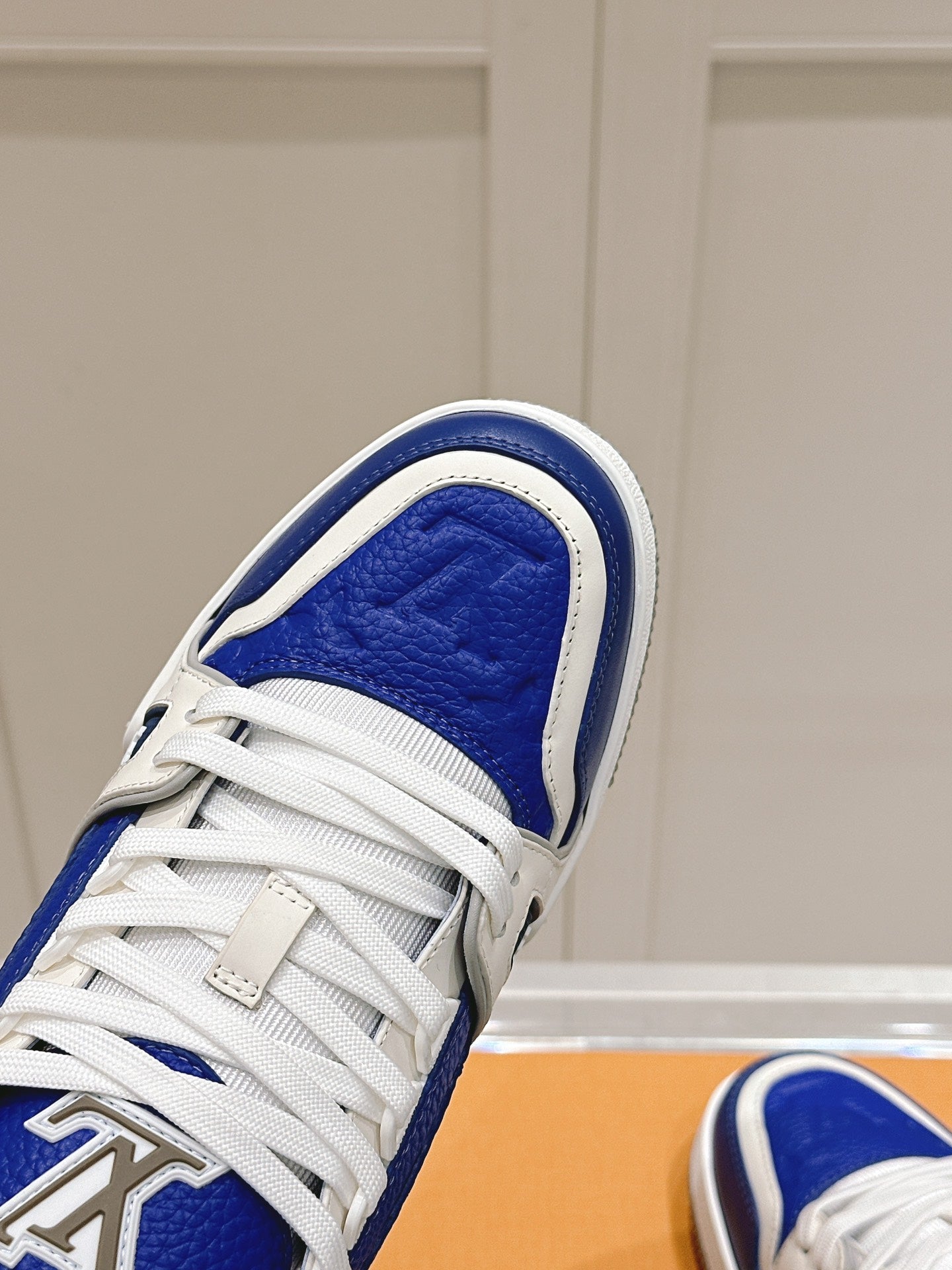 LOUIS VUITTON LV TRAINER SNEAKER IN GASTON BLUE GRAINED CALFSKIN