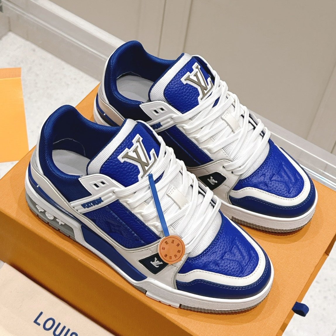 LOUIS VUITTON LV TRAINER SNEAKER IN GASTON BLUE GRAINED CALFSKIN