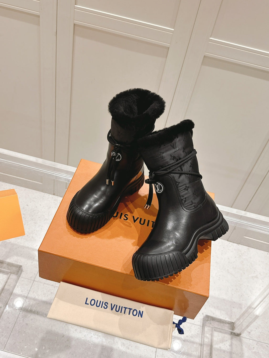 LOUIS VUITTON RUBY FLAT ANKLE BOOT IN BLACK CALFSKIN AND MONOGRAM NYLON