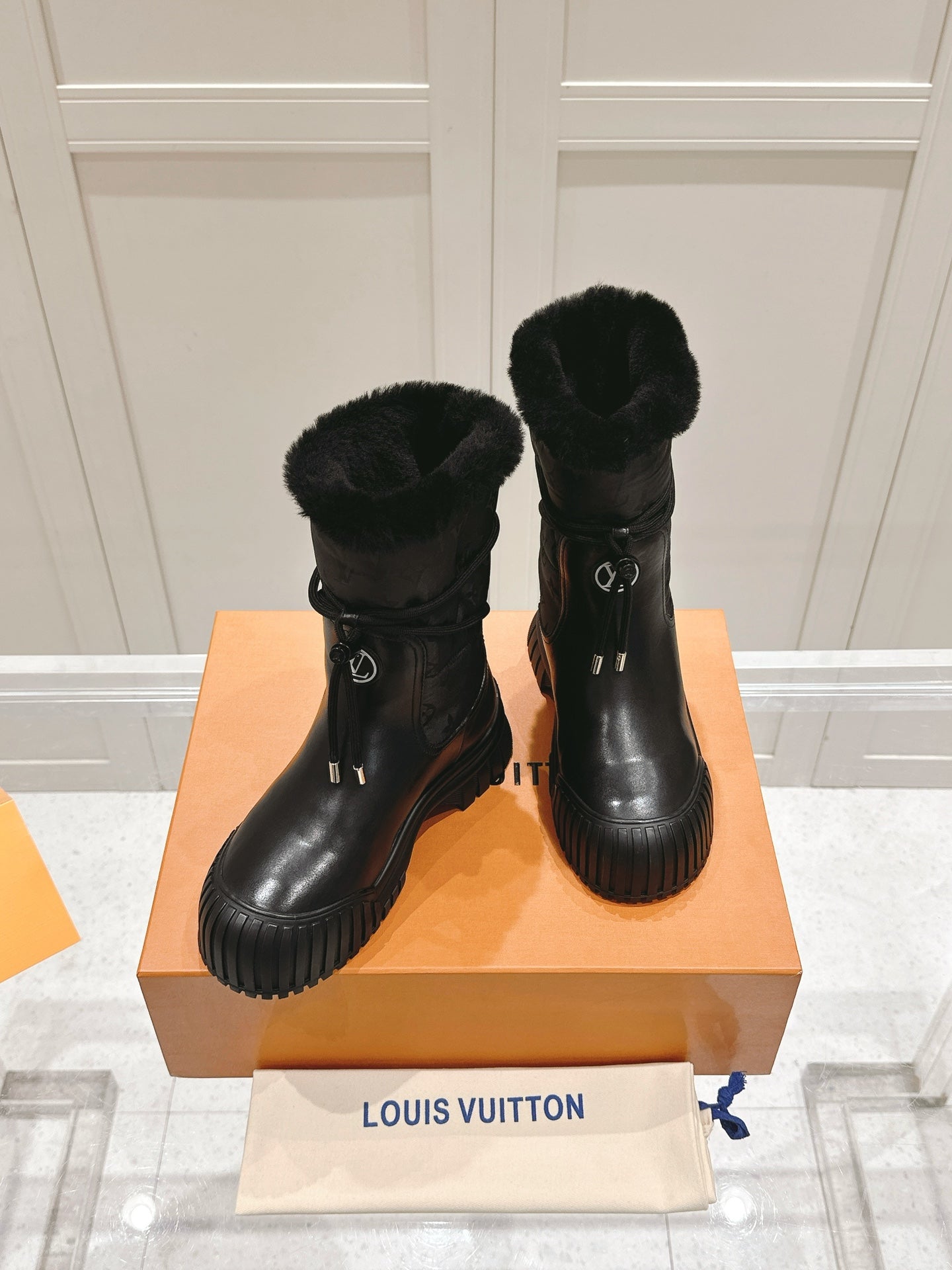 LOUIS VUITTON RUBY FLAT ANKLE BOOT IN BLACK CALFSKIN AND MONOGRAM NYLON