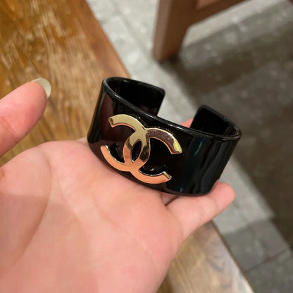 Designer Inspired Black Bangle Bracelet with Gold Logo - Hình 4