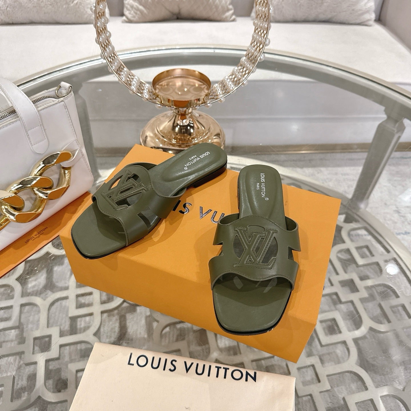 LOUIS VUITTON ISOLA FLAT SLIDE IN ARMY GREEN CALFSKIN