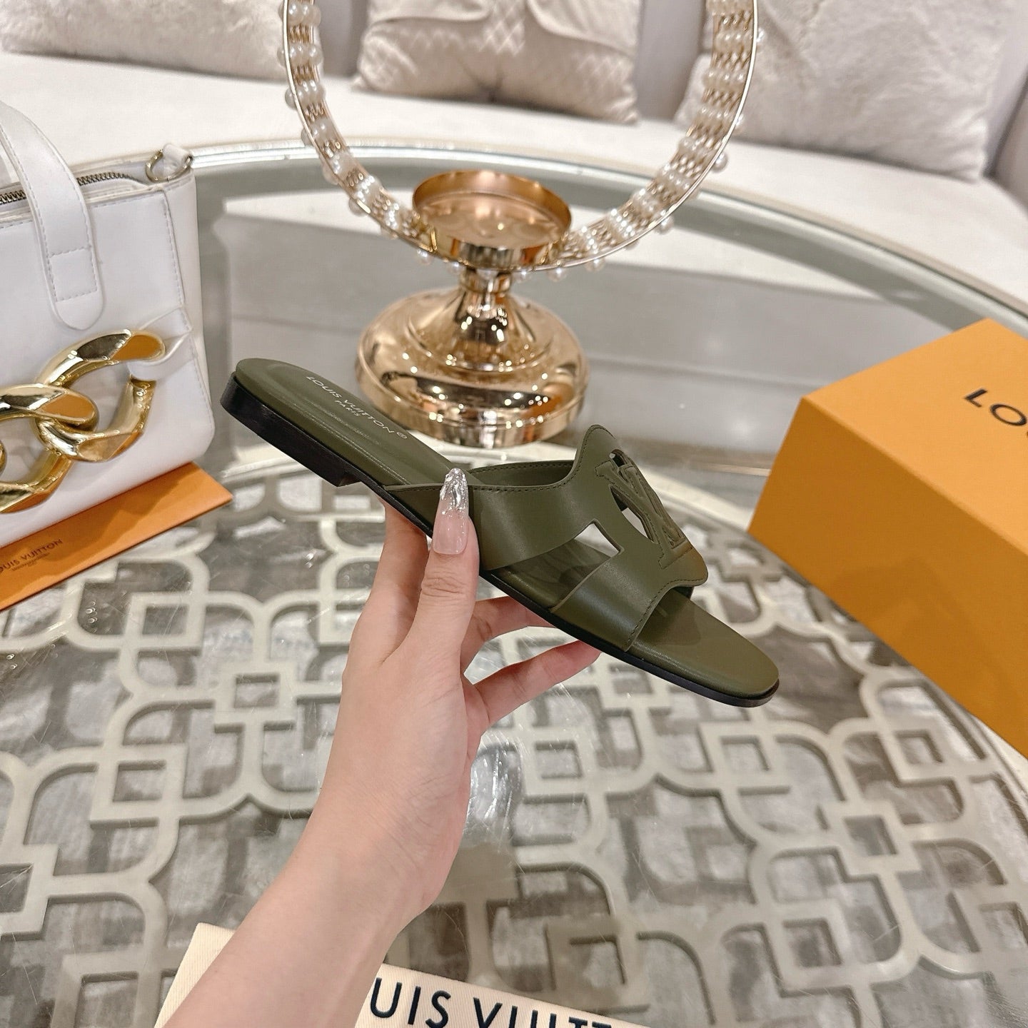 LOUIS VUITTON ISOLA FLAT SLIDE IN ARMY GREEN CALFSKIN