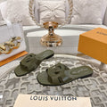 LOUIS VUITTON ISOLA FLAT SLIDE IN ARMY GREEN CALFSKIN