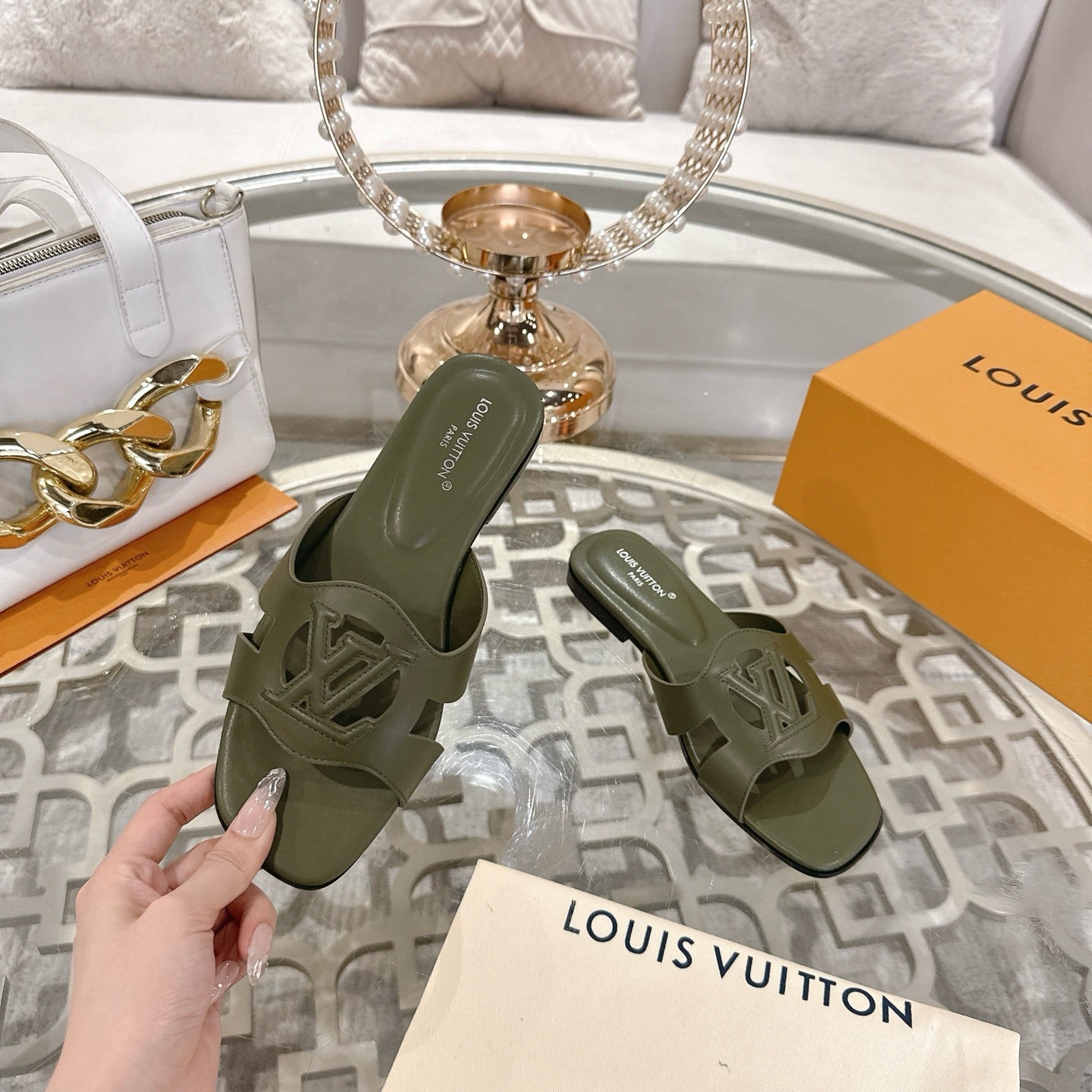 LOUIS VUITTON ISOLA FLAT SLIDE IN ARMY GREEN CALFSKIN