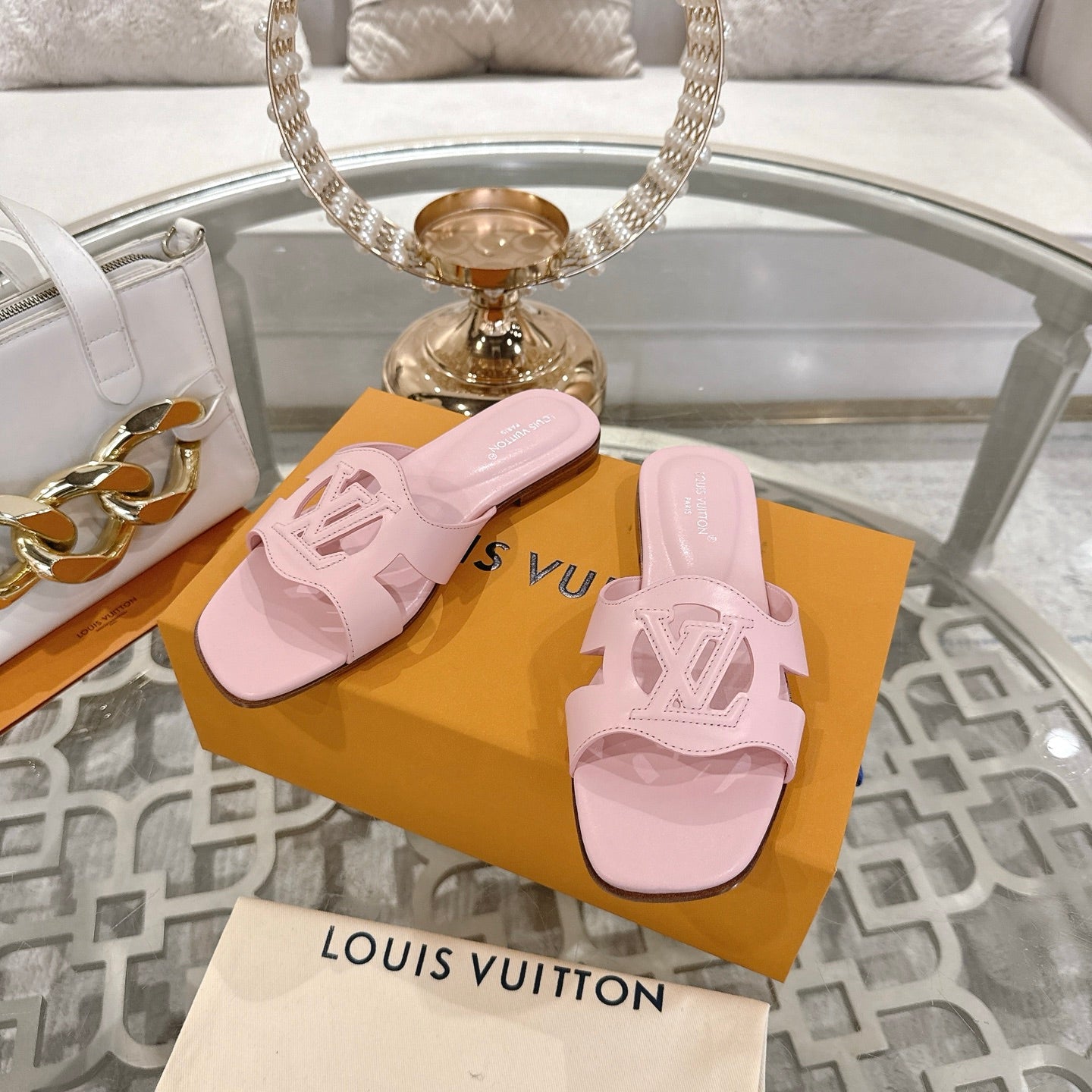 LOUIS VUITTON ISOLA FLAT SLIDE IN PASTEL PINK CALFSKIN