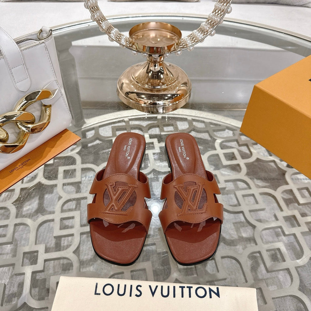 LOUIS VUITTON ISOLA FLAT SLIDE IN PENNY BROWN CALFSKIN