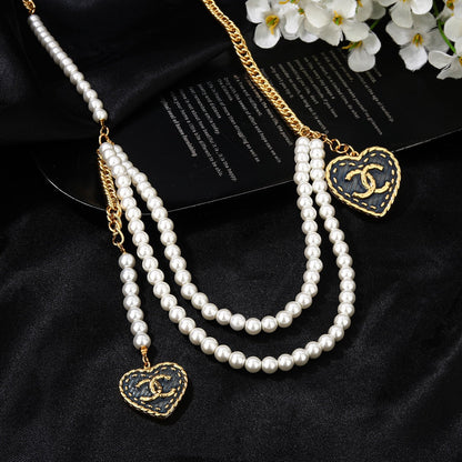 CHANEL 25S CHAIN BELT IN WHITE PEARL 614480