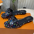 LOUIS VUITTON BOW FLAT MULES IN BLACK MONOGRAM LAMBSKIN