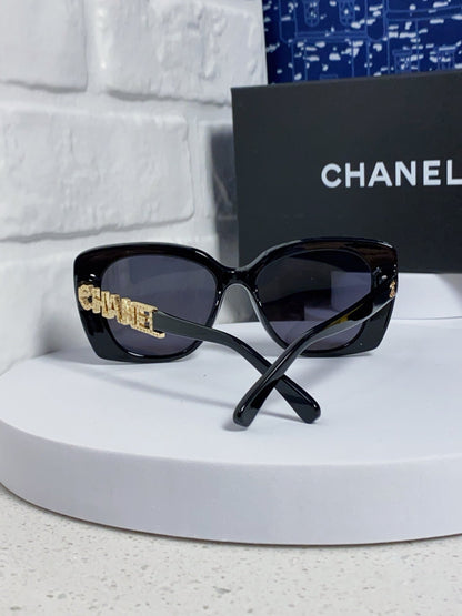 CHANEL BUTTERFLY SUNGLASSES 641816 IN BLACK ACETATE GOLD METAL LOGO