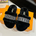 LOUIS VUITTON FURRY SLIPPER IN BLACK SHEARLING