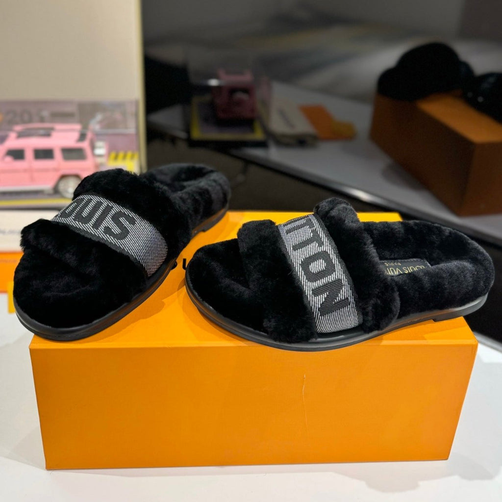 LOUIS VUITTON FURRY SLIPPER IN BLACK SHEARLING