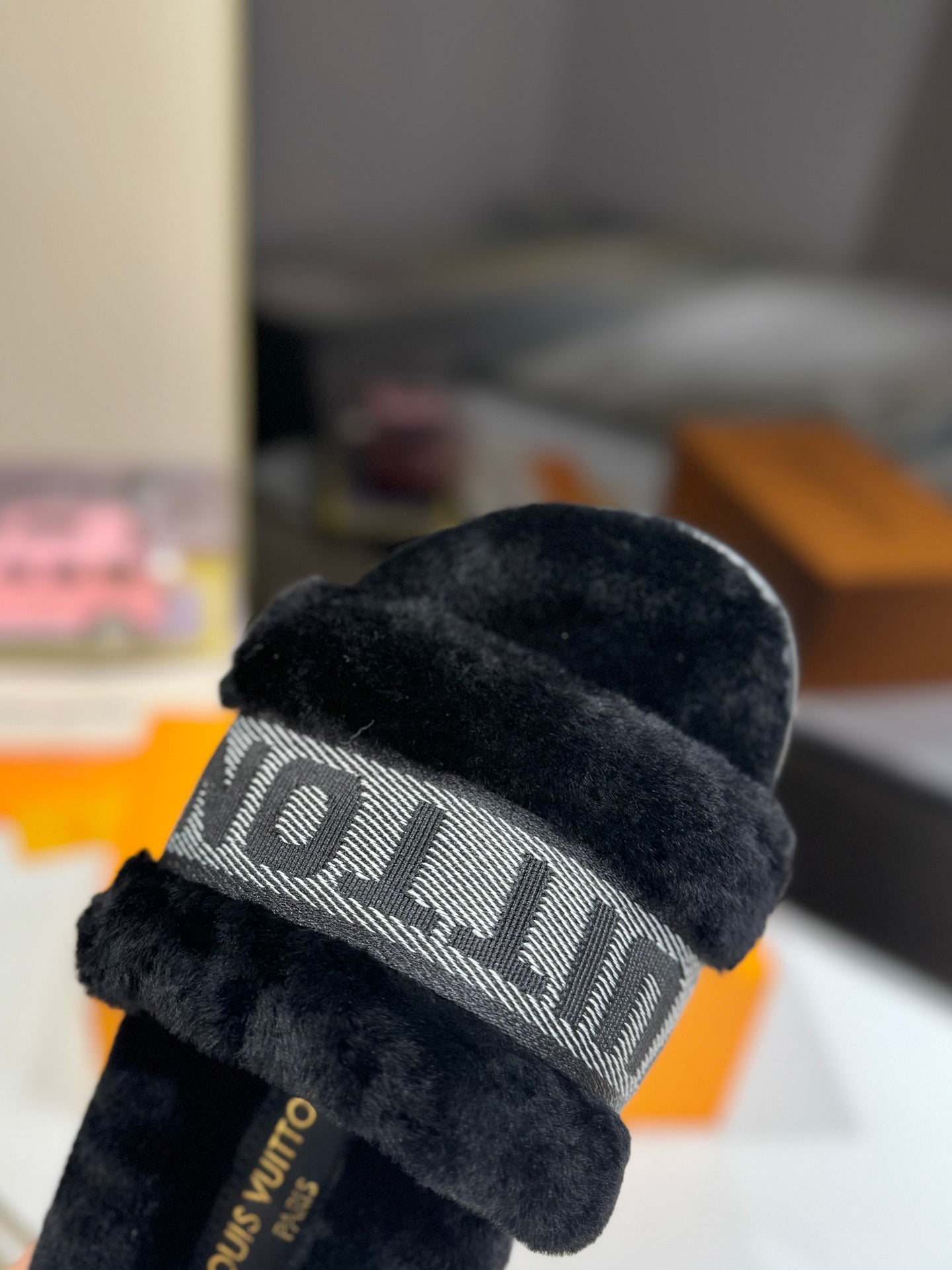 LOUIS VUITTON FURRY SLIPPER IN BLACK SHEARLING