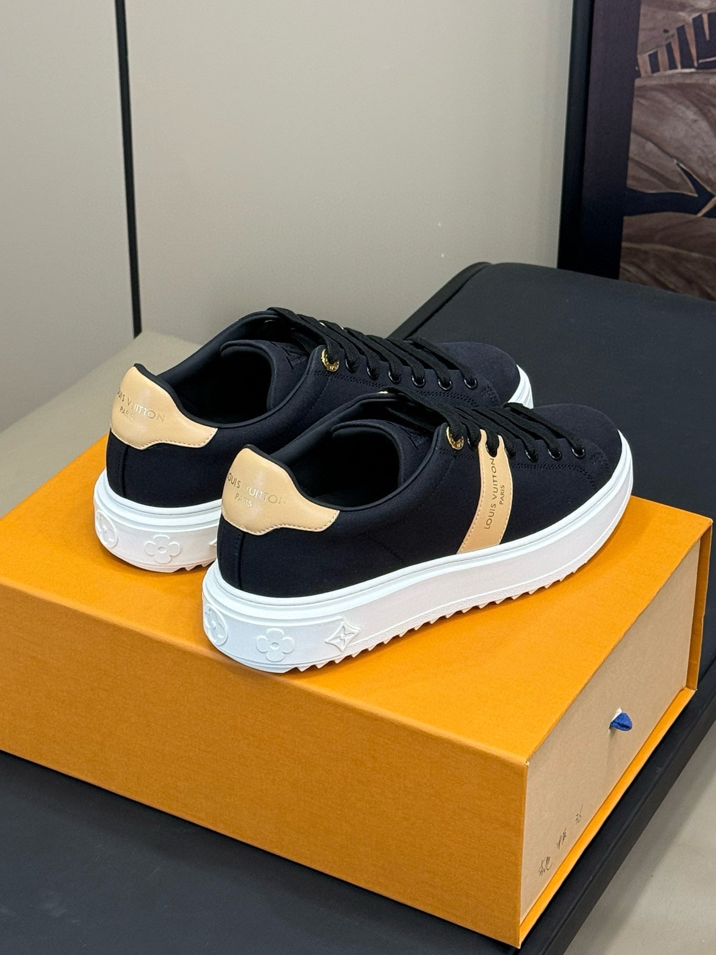 LOUIS VUITTON LV TIME OUT SNEAKER IN BLACK MIX MACAROON GOLD CANVAS
