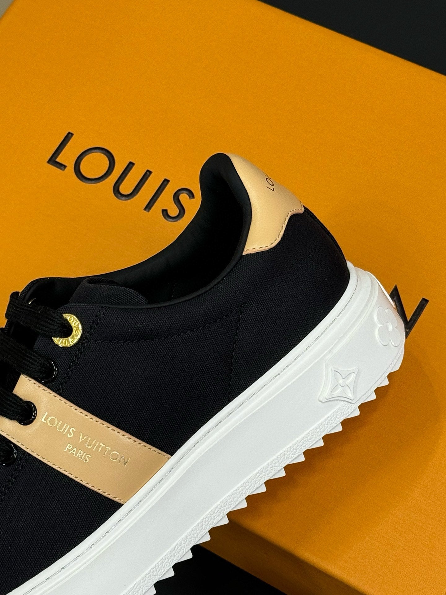 LOUIS VUITTON LV TIME OUT SNEAKER IN BLACK MIX MACAROON GOLD CANVAS
