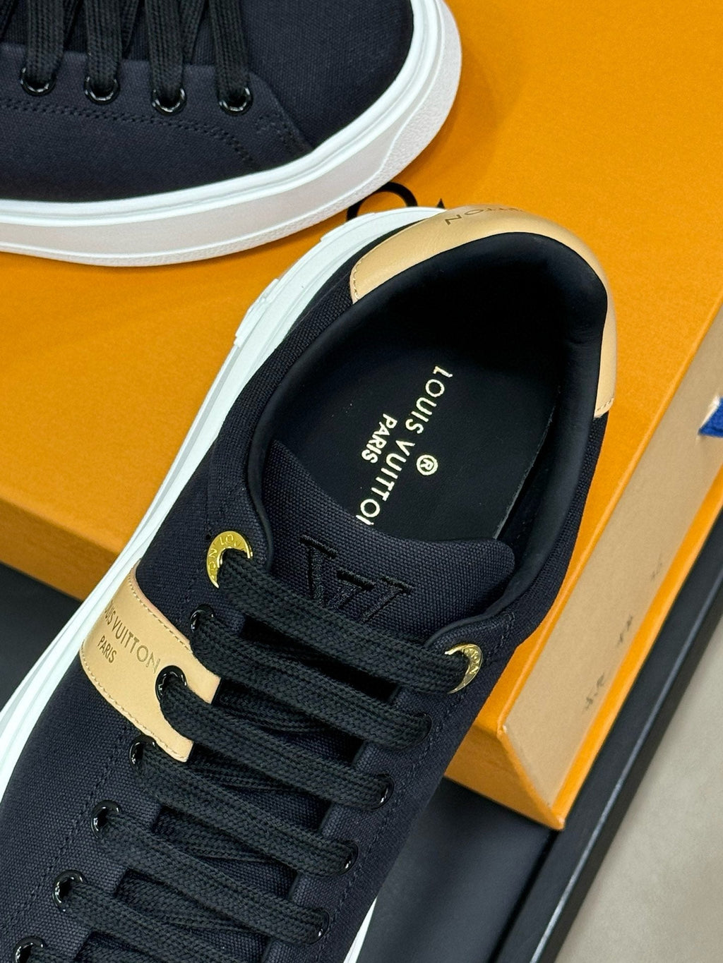 LOUIS VUITTON LV TIME OUT SNEAKER IN BLACK MIX MACAROON GOLD CANVAS