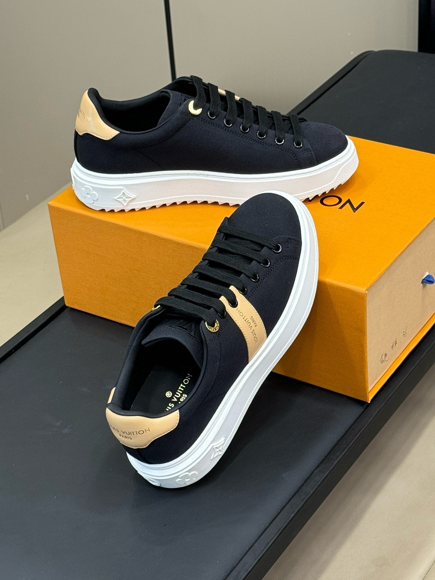 LOUIS VUITTON LV TIME OUT SNEAKER IN BLACK MIX MACAROON GOLD CANVAS