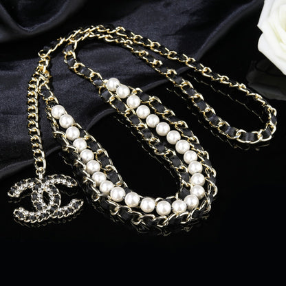 CHANEL 25S CHAIN BELT IN WHITE PEARL AND BLACK CALFSKIN 612711